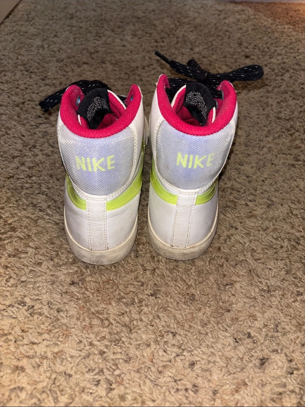 Nike White High-Top Sneakers with Yellow Swoosh and Pink Lining